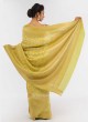 Yellow And Mehndi Green Chiffon Silk Saree